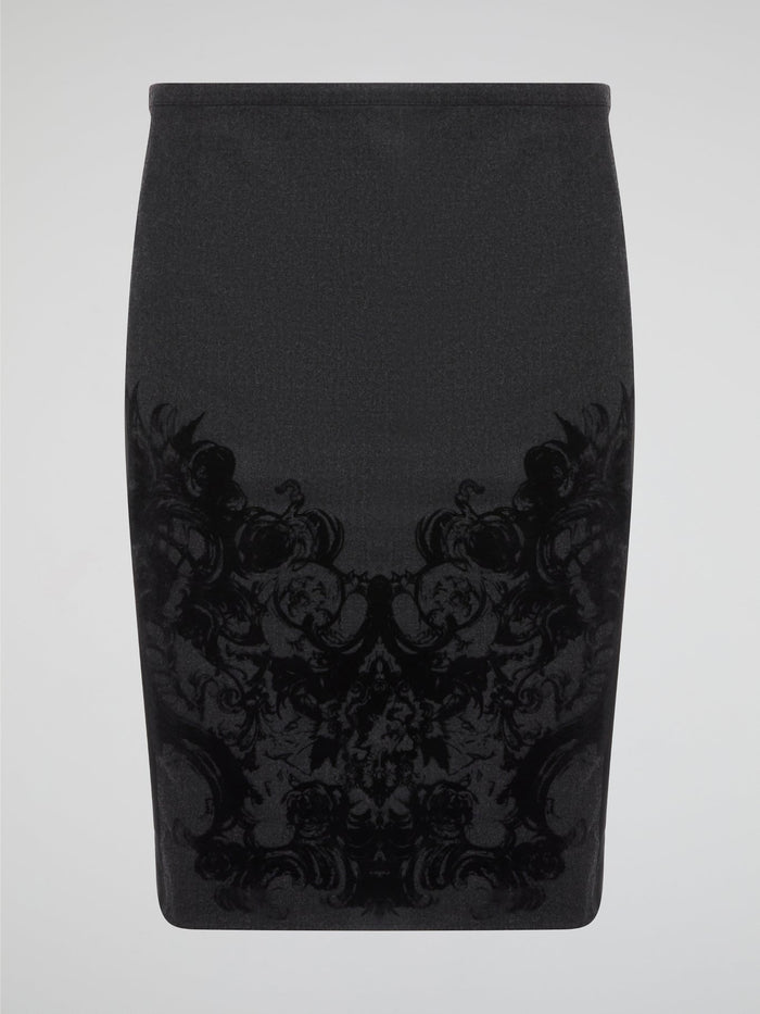 Elevate your office attire with this stunning grey printed pencil skirt from iconic designer Roberto Cavalli. The intricate pattern adds a touch of sophistication and style, making you stand out from the crowd. Pair it with a crisp white blouse and heels for a polished and fashion-forward look that will turn heads wherever you go.