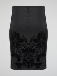Elevate your office attire with this stunning grey printed pencil skirt from iconic designer Roberto Cavalli. The intricate pattern adds a touch of sophistication and style, making you stand out from the crowd. Pair it with a crisp white blouse and heels for a polished and fashion-forward look that will turn heads wherever you go.