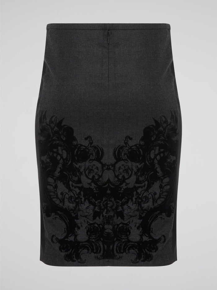 Elevate your office attire with this stunning grey printed pencil skirt from iconic designer Roberto Cavalli. The intricate pattern adds a touch of sophistication and style, making you stand out from the crowd. Pair it with a crisp white blouse and heels for a polished and fashion-forward look that will turn heads wherever you go.
