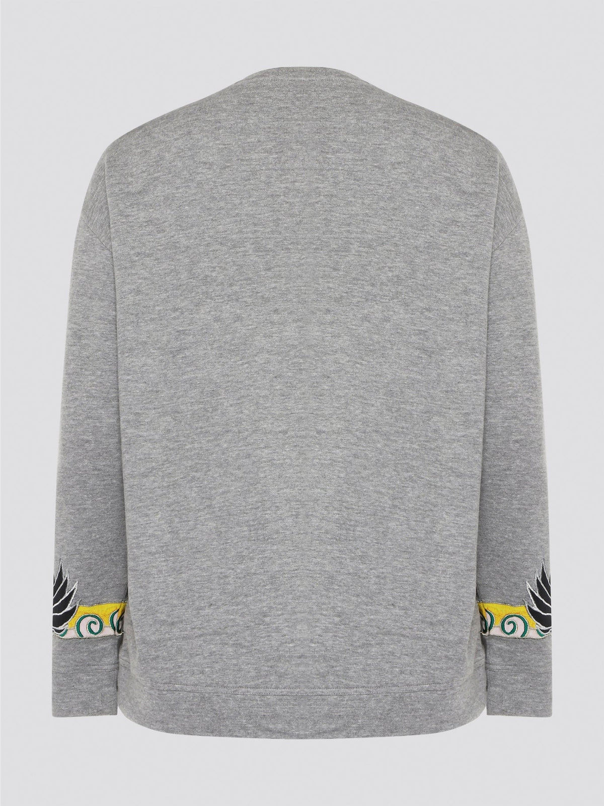 Elevate your casual wardrobe with this effortlessly chic Grey Embroidered Sweatshirt from Roberto Cavalli. Crafted with intricate floral embroidery, this sweatshirt adds a touch of luxury to your everyday look. Pair it with jeans for a stylish and comfortable outfit that will turn heads wherever you go.