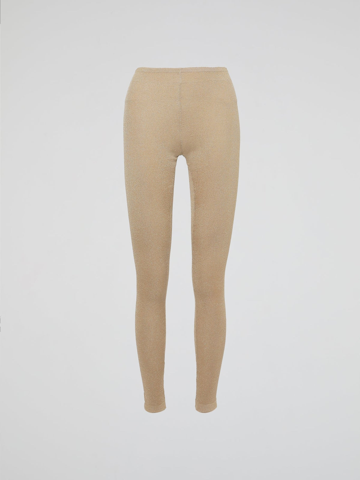 Wrap your legs in luxurious comfort and style with our Beige Knitted Leggings by Roberto Cavalli. Made from the finest quality fabrics, these leggings are expertly designed to provide a seamless fit that sculpts and contours your silhouette flawlessly. Whether you're lounging at home or stepping out for a night on the town, these leggings are the perfect blend of elegance and relaxation.