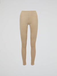 Wrap your legs in luxurious comfort and style with our Beige Knitted Leggings by Roberto Cavalli. Made from the finest quality fabrics, these leggings are expertly designed to provide a seamless fit that sculpts and contours your silhouette flawlessly. Whether you're lounging at home or stepping out for a night on the town, these leggings are the perfect blend of elegance and relaxation.