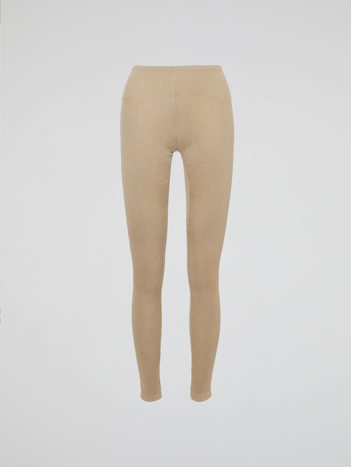 Wrap your legs in luxurious comfort and style with our Beige Knitted Leggings by Roberto Cavalli. Made from the finest quality fabrics, these leggings are expertly designed to provide a seamless fit that sculpts and contours your silhouette flawlessly. Whether you're lounging at home or stepping out for a night on the town, these leggings are the perfect blend of elegance and relaxation.