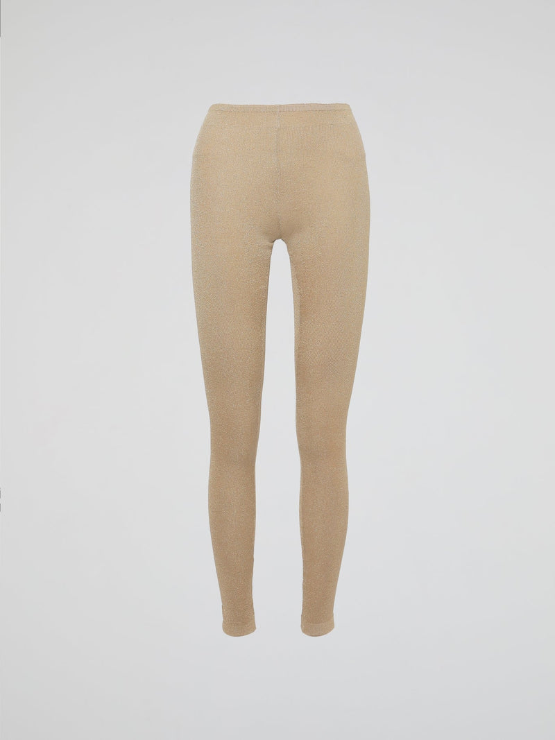 Wrap your legs in luxurious comfort and style with our Beige Knitted Leggings by Roberto Cavalli. Made from the finest quality fabrics, these leggings are expertly designed to provide a seamless fit that sculpts and contours your silhouette flawlessly. Whether you're lounging at home or stepping out for a night on the town, these leggings are the perfect blend of elegance and relaxation.