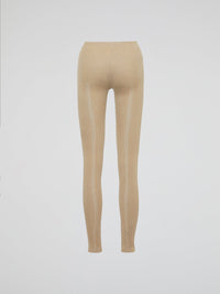 Wrap your legs in luxurious comfort and style with our Beige Knitted Leggings by Roberto Cavalli. Made from the finest quality fabrics, these leggings are expertly designed to provide a seamless fit that sculpts and contours your silhouette flawlessly. Whether you're lounging at home or stepping out for a night on the town, these leggings are the perfect blend of elegance and relaxation.