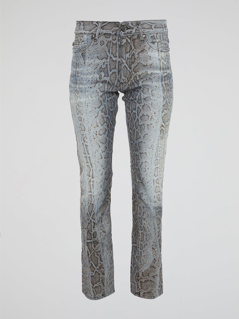 Unleash your wild side with the Roberto Cavalli Snake Print Denim Jeans, a bold and daring addition to your wardrobe that will turn heads wherever you go. Crafted from high-quality denim, these jeans feature a sleek snake print design that adds a touch of edgy sophistication to any outfit. Embrace your inner fashionista and elevate your style with these statement-making jeans that are sure to make you stand out from the crowd.