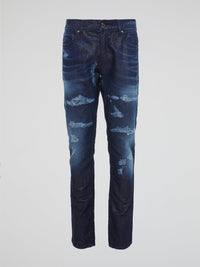 Experience the ultimate in denim luxury with our Navy Distressed Slim Fit Jeans by Roberto Cavalli. Crafted with precision and attention to detail, these jeans are a work of art, combining edgy distressing with a sleek slim fit silhouette. Make a bold fashion statement with these versatile jeans that will take you from day to night in style.