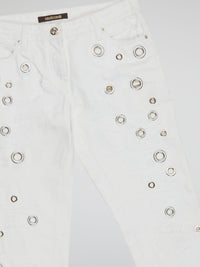 Elevate your denim game with these stunning White Embellished Denim Jeans by Roberto Cavalli. Featuring intricate beadwork and shimmering embellishments, these jeans are truly a work of art. Stand out from the crowd and make a statement with these one-of-a-kind, luxurious jeans.