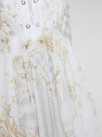 Feel like a modern-day goddess in this ethereal White Printed Lace Up Maxi Dress by Roberto Cavalli. The intricate lace detailing and flattering silhouette will make you stand out at any event or special occasion. Embrace your inner fashionista and leave a lasting impression in this stunning and unforgettable piece.