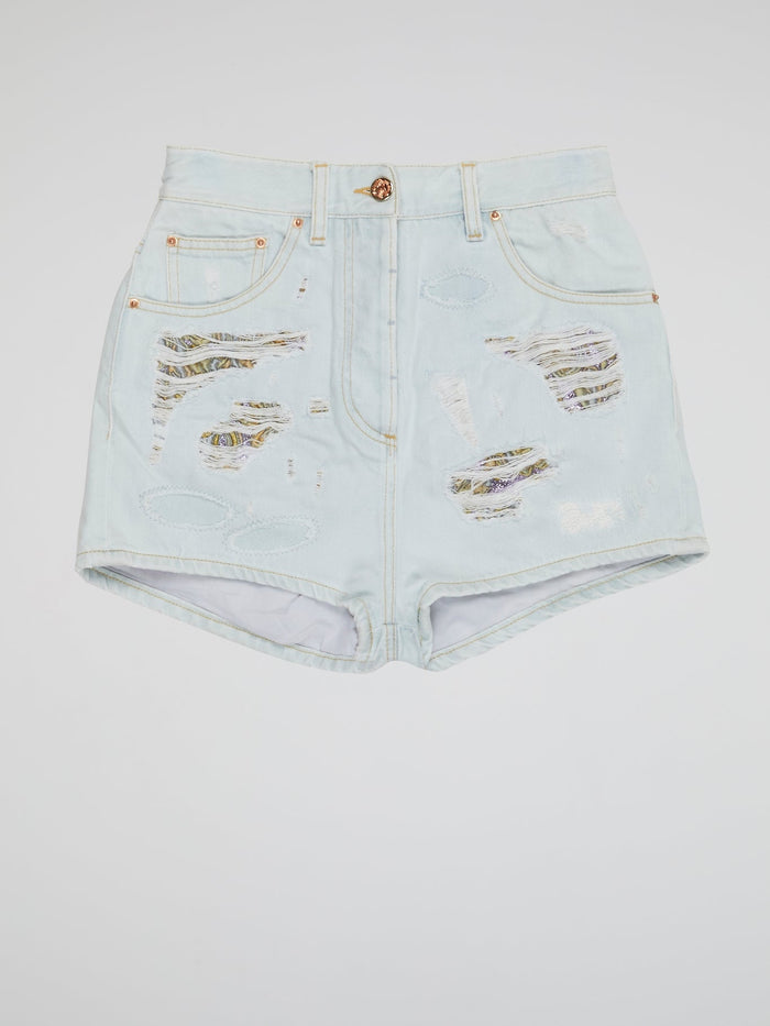 Embrace your inner rebel with our Blue Distressed Denim Shorts by Roberto Cavalli- perfect for any daring fashionista looking to make a statement. With a worn-in look and edgy vibes, these shorts are sure to turn heads wherever you go. From music festivals to beach days, these shorts are a must-have addition to your wardrobe for a bold and fearless style.