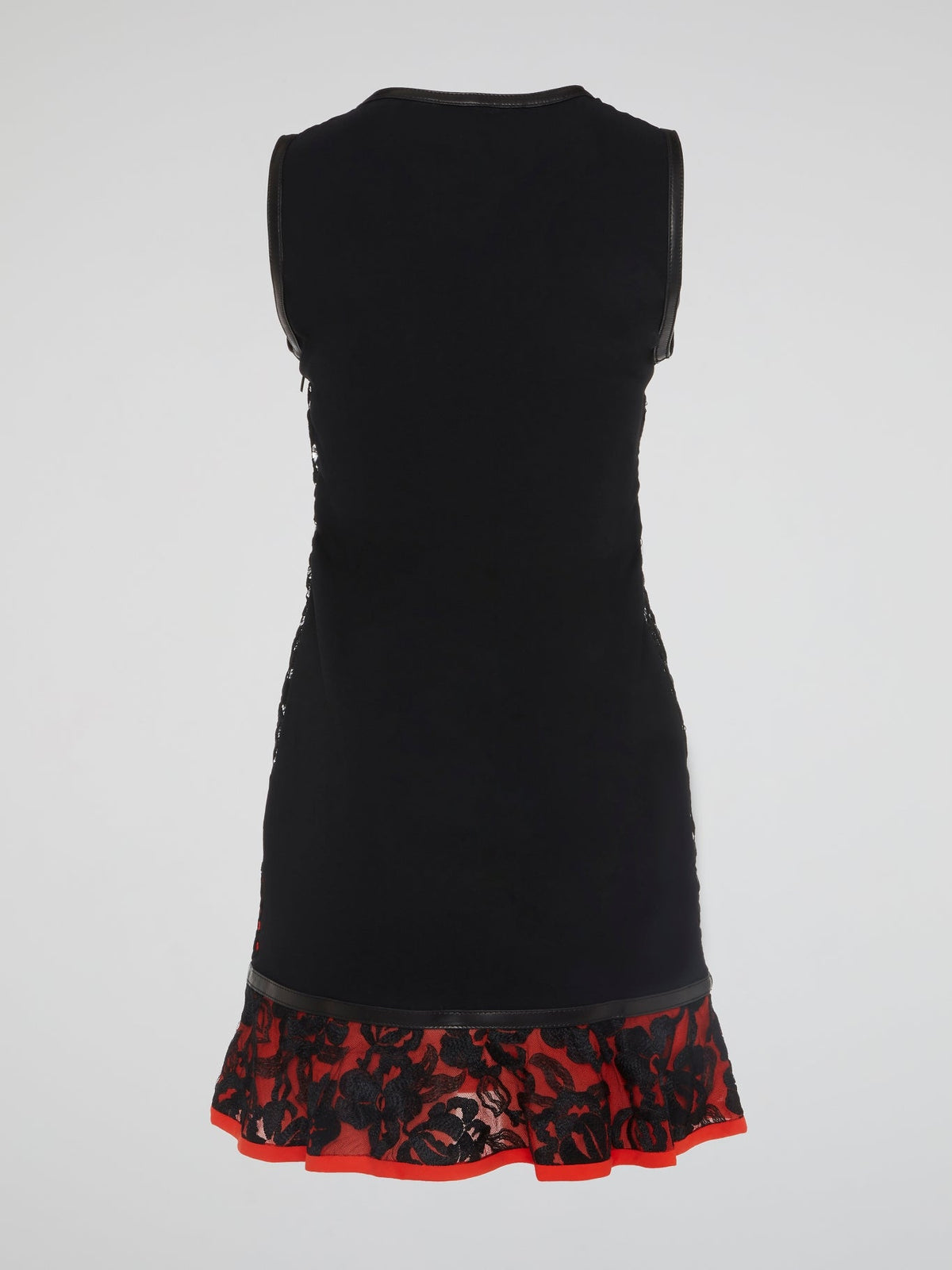 Indulge in the fierce elegance of the Roberto Cavalli Leopard Pattern Lace Overlay Dress. Embrace your wild side with the intricate lace detailing and bold leopard print design. Stand out from the crowd and unleash your inner fashionista with this show-stopping statement piece.