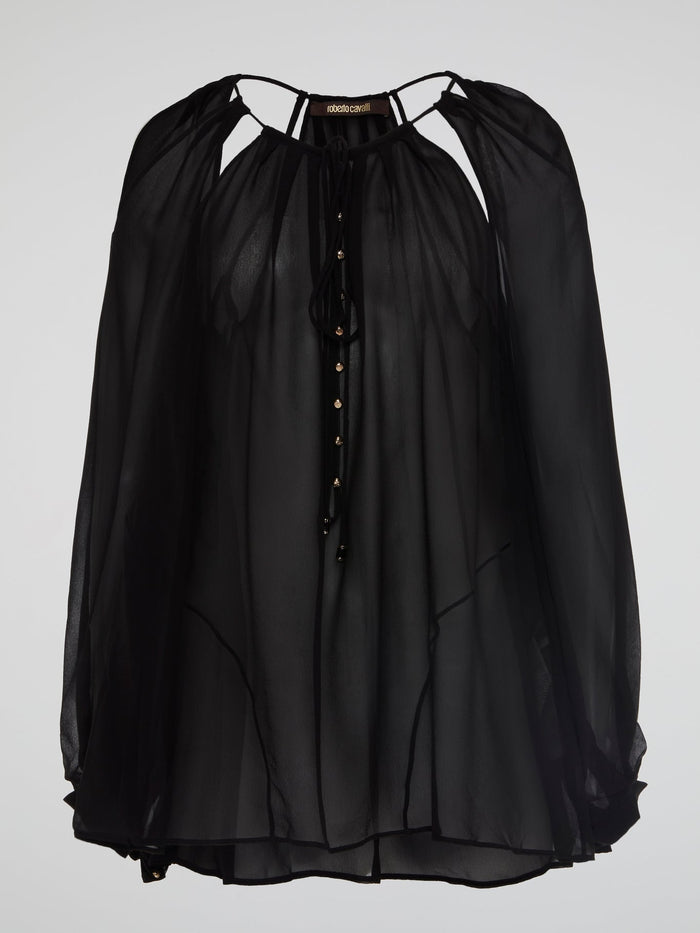 Elevate your wardrobe with the bold and edgy Black Cut Out Blouse from Roberto Cavalli, perfect for making a statement wherever you go. The intricate cut-out design adds a touch of allure, while the flattering silhouette ensures a chic and sophisticated look. Stand out from the crowd and turn heads with this stunning piece that exudes confidence and style.