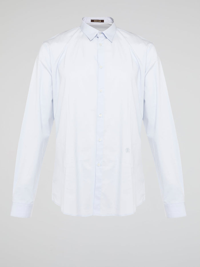 Elevate your wardrobe with the effortlessly chic White Long Sleeve Shirt by Roberto Cavalli. Crafted from luxurious fabric with impeccable attention to detail, this versatile piece exudes sophistication and glamour. Embrace a timeless look that seamlessly transitions from day to night with this must-have staple.