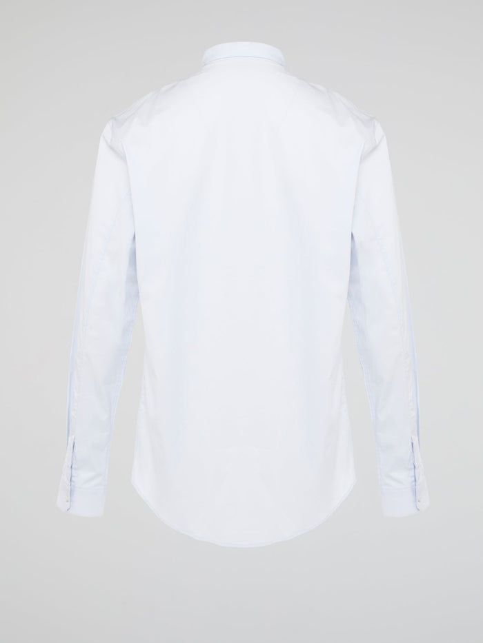 Elevate your wardrobe with the effortlessly chic White Long Sleeve Shirt by Roberto Cavalli. Crafted from luxurious fabric with impeccable attention to detail, this versatile piece exudes sophistication and glamour. Embrace a timeless look that seamlessly transitions from day to night with this must-have staple.