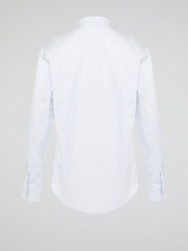 Elevate your wardrobe with the effortlessly chic White Long Sleeve Shirt by Roberto Cavalli. Crafted from luxurious fabric with impeccable attention to detail, this versatile piece exudes sophistication and glamour. Embrace a timeless look that seamlessly transitions from day to night with this must-have staple.