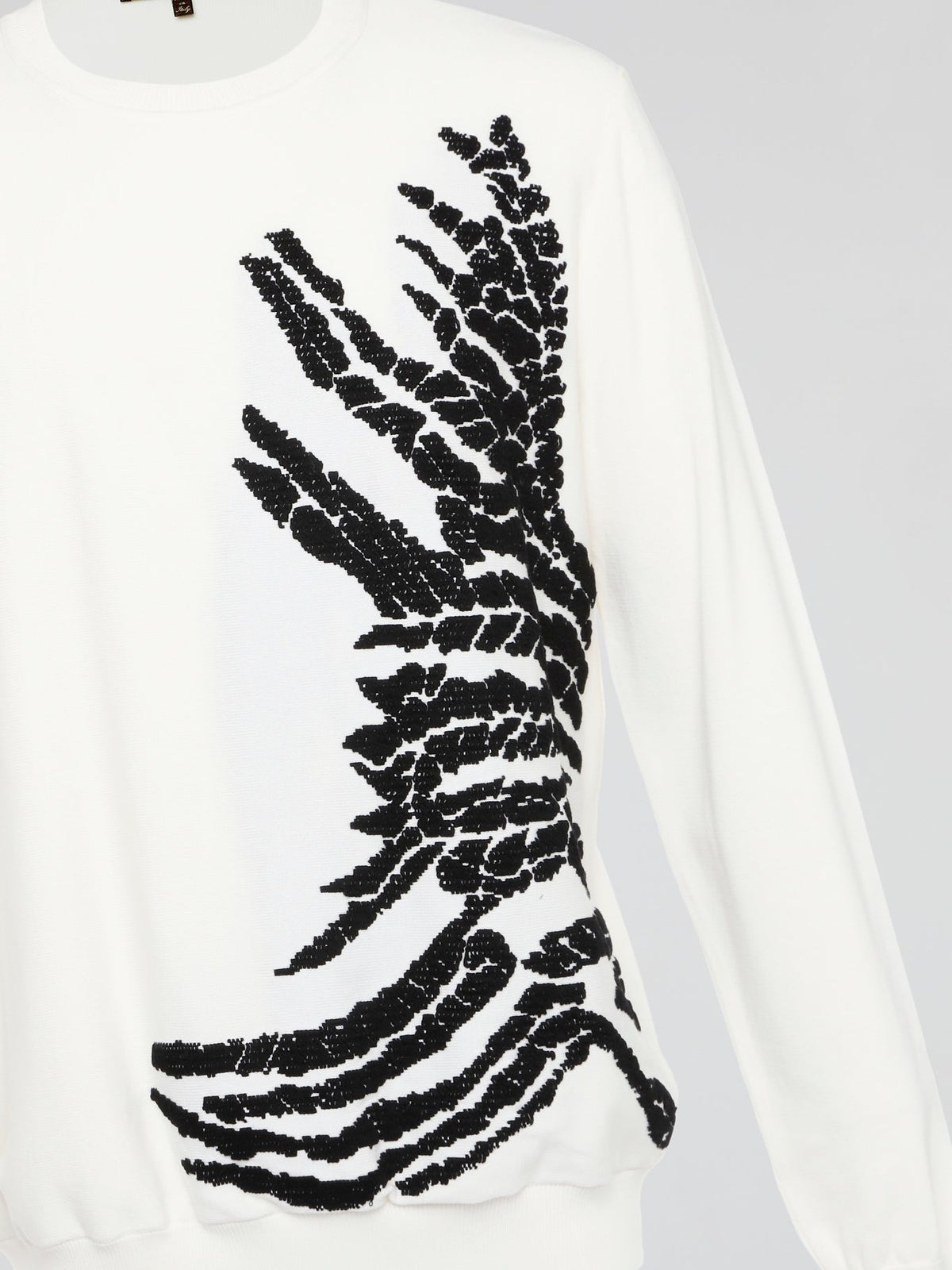 Wrap yourself in pure luxury with this exquisite white embroidered sweatshirt from Roberto Cavalli. The intricate detailing and soft fabric ensure both comfort and style, making it the perfect statement piece for any occasion. Elevate your wardrobe with this timeless and effortlessly chic addition that is sure to turn heads wherever you go.