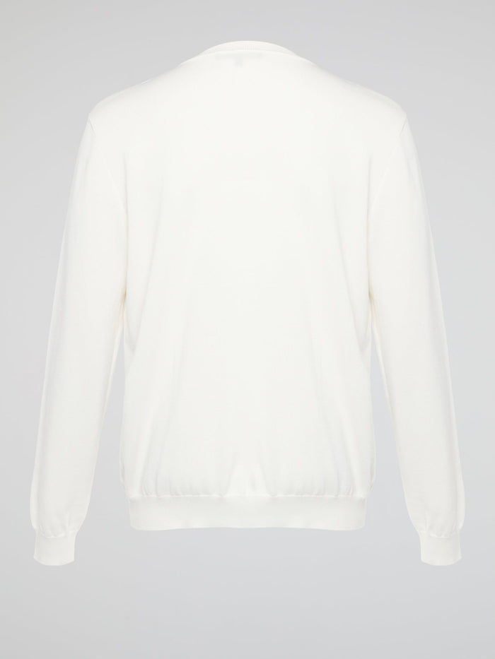 Wrap yourself in pure luxury with this exquisite white embroidered sweatshirt from Roberto Cavalli. The intricate detailing and soft fabric ensure both comfort and style, making it the perfect statement piece for any occasion. Elevate your wardrobe with this timeless and effortlessly chic addition that is sure to turn heads wherever you go.