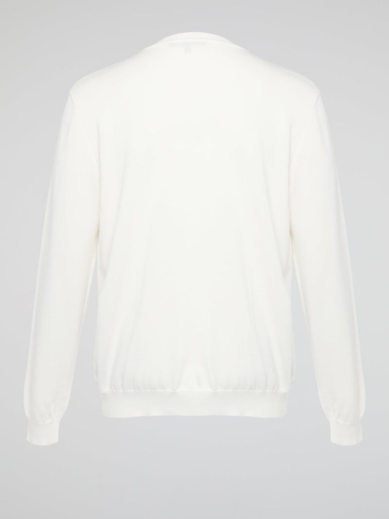 Wrap yourself in pure luxury with this exquisite white embroidered sweatshirt from Roberto Cavalli. The intricate detailing and soft fabric ensure both comfort and style, making it the perfect statement piece for any occasion. Elevate your wardrobe with this timeless and effortlessly chic addition that is sure to turn heads wherever you go.