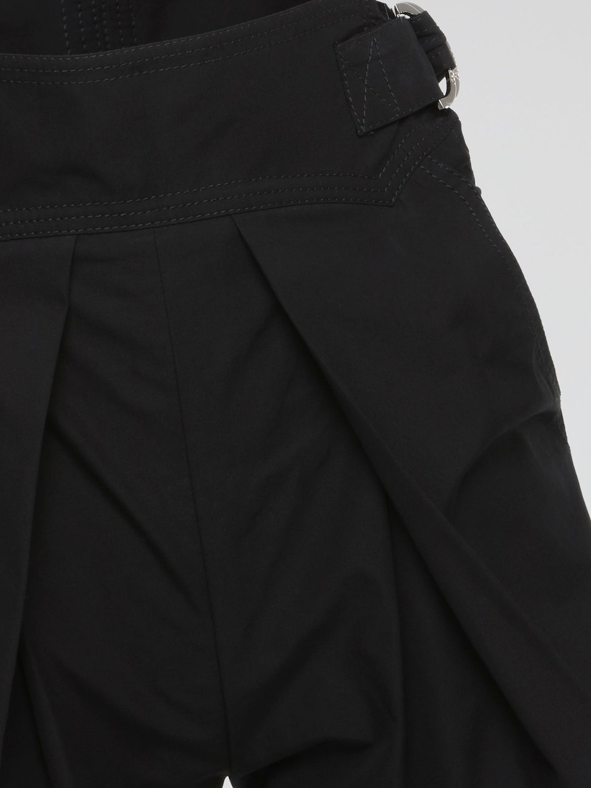 Elevate your casual style with our Black Cargo Shorts by Roberto Cavalli, designed for the modern man who values comfort and sophistication. Made with high-quality fabric and attention to detail, these shorts are perfect for everyday wear or a weekend getaway. Stand out from the crowd and make a statement with your fashion choices in these versatile and stylish cargo shorts.