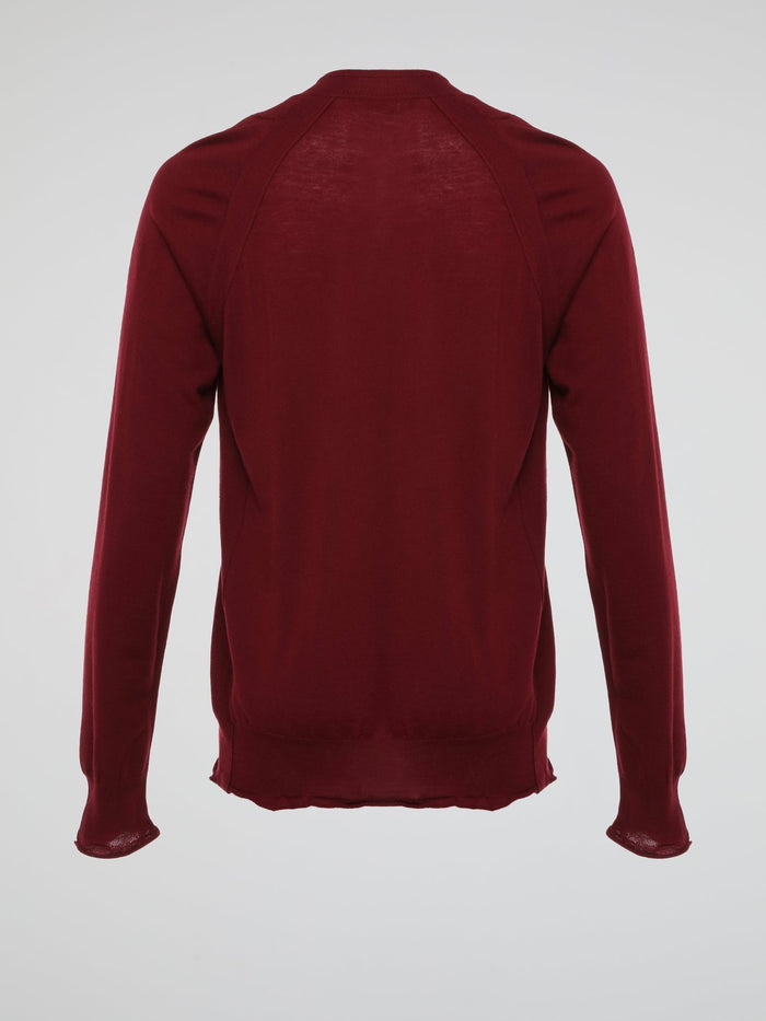 Wrap yourself in luxurious comfort with the Burgundy Knitted Sweatshirt by Roberto Cavalli. Crafted from ultra-soft materials, this enchanting garment envelops you in warmth while showcasing Cavalli's signature elegance. The stunning burgundy hue and intricate knitted pattern make this sweatshirt a standout piece, perfect for adding a dash of sophistication to your everyday wardrobe.