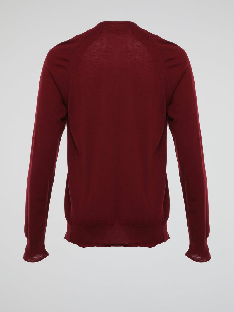 Wrap yourself in luxurious comfort with the Burgundy Knitted Sweatshirt by Roberto Cavalli. Crafted from ultra-soft materials, this enchanting garment envelops you in warmth while showcasing Cavalli's signature elegance. The stunning burgundy hue and intricate knitted pattern make this sweatshirt a standout piece, perfect for adding a dash of sophistication to your everyday wardrobe.