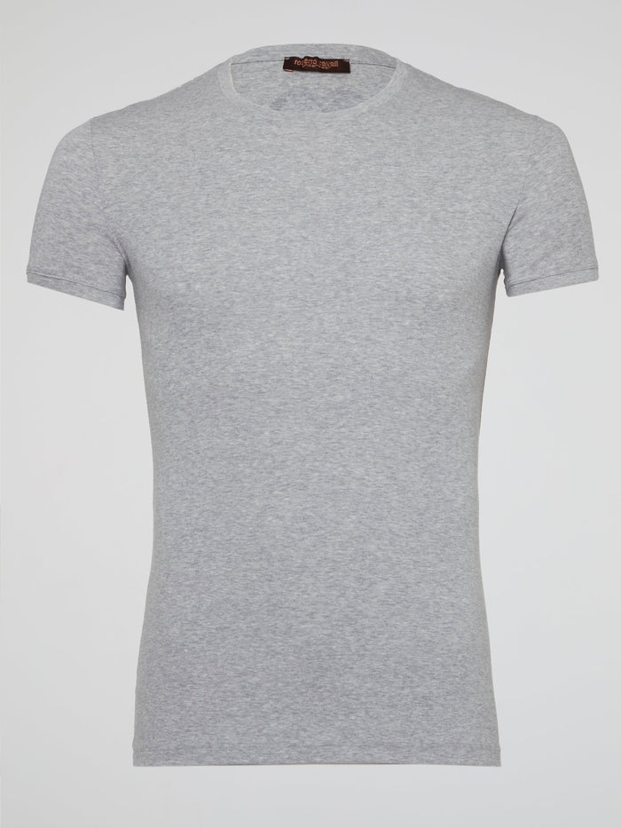 Elevate your casual wardrobe with the Grey Logo Print T-Shirt by Roberto Cavalli Underwear, a stylish statement piece that combines comfort and luxury effortlessly. Made with premium materials and featuring the iconic Roberto Cavalli logo prominently displayed, this t-shirt is a must-have for fashion-forward individuals looking to make a bold impression. Stand out from the crowd and showcase your impeccable taste with this eye-catching piece that is sure to turn heads wherever you go.