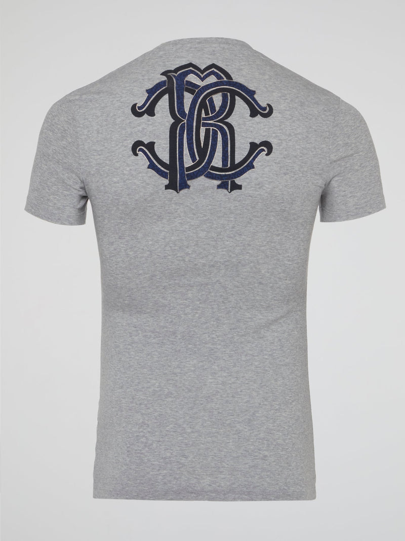 Elevate your everyday style with the effortlessly chic Grey Logo Print V-Neck T-Shirt from Roberto Cavalli Underwear. Crafted from soft, premium materials, this tee features a sleek logo print that adds a touch of luxury to your casual look. Perfect for layering or wearing on its own, this versatile piece will surely become a go-to in your wardrobe.