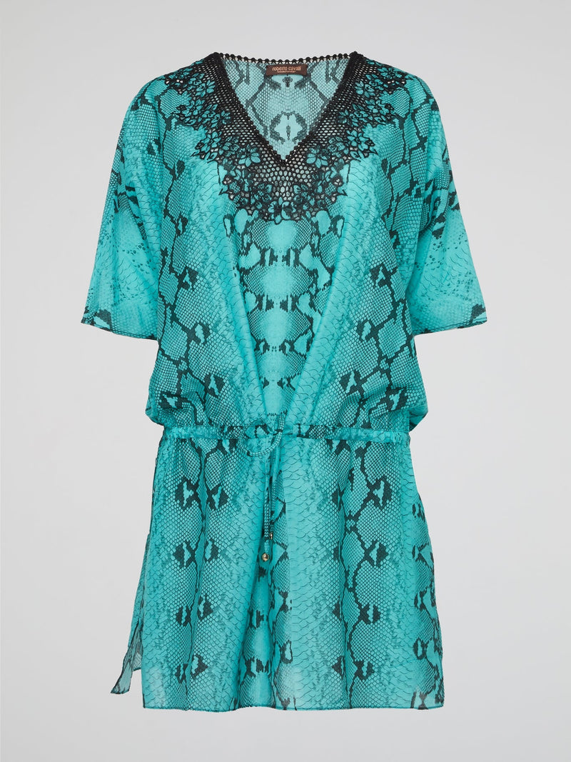 Embrace your wild side with the luxurious Green Snake Print Kaftan by Roberto Cavalli. This stunning piece will make you feel like a tropical goddess, with its flowing silhouette and eye-catching snake print design. Perfect for lounging by the pool or making a statement at a beach party, this kaftan is sure to turn heads wherever you go.