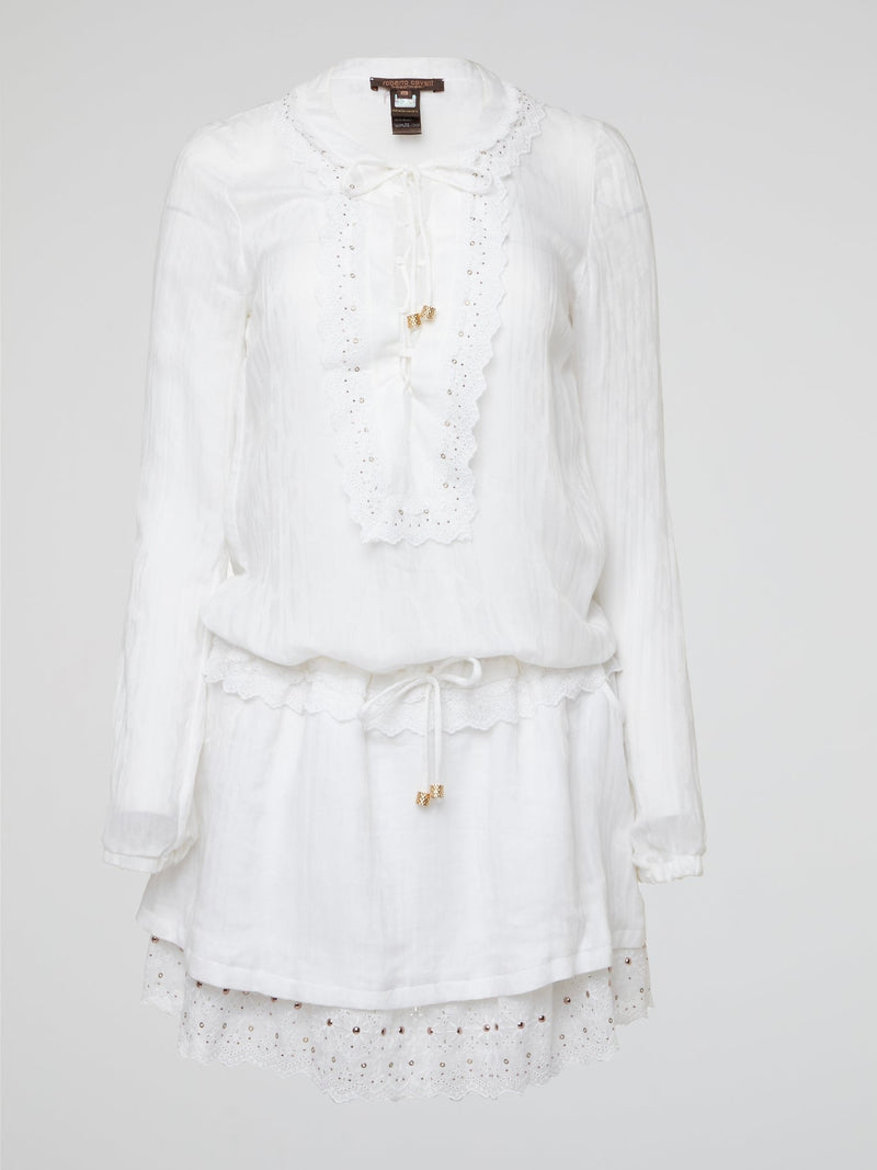 Indulge in the intricate charm of this ethereal white lace up boho dress by Roberto Cavalli, designed to make you feel like a goddess gliding through a field of wildflowers. The delicate lace detailing and flattering silhouette will have you twirling with joy at every summer soiree and beachside sunset. Embrace your inner bohemian spirit and set the trend with this timeless piece that exudes effortless elegance and feminine allure.