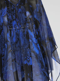 Introducing the alluring Floral Pleated Panel Kaftan by Roberto Cavalli, a masterpiece that effortlessly combines elegance with vibrant nature-inspired prints. Flowing gracefully with its pleated panels and billowing sleeves, this kaftan is designed for the modern fashionista who wants to make a statement. Whether you're strolling along sandy beaches or attending a lavish garden party, this kaftan will ensure you stand out as a true goddess of style.