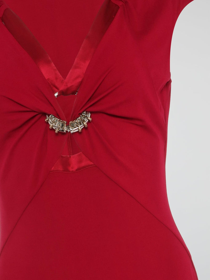 Turn heads wherever you go with the Red Embellished Bodycon Dress by Roberto Cavalli. This statement-making stunner features intricate embellishments that beautifully catch the light, adding a touch of glamour to your every move. With its figure-hugging silhouette and bold red hue, this dress is the perfect choice for making a lasting impression at any special occasion.