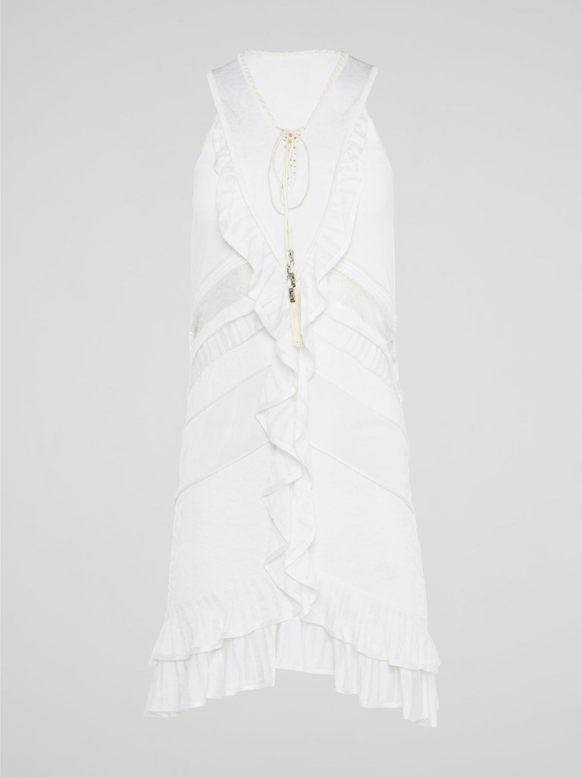 The White Ruffle Dress by Roberto Cavalli will transport you to dreamy summer nights with its ethereal charm. Crafted with intricate layers of delicate ruffles, this dress effortlessly merges elegance with playfulness. From a casual garden party to a glamorous evening soir��e, this dress is guaranteed to turn heads and make you feel like a true goddess.