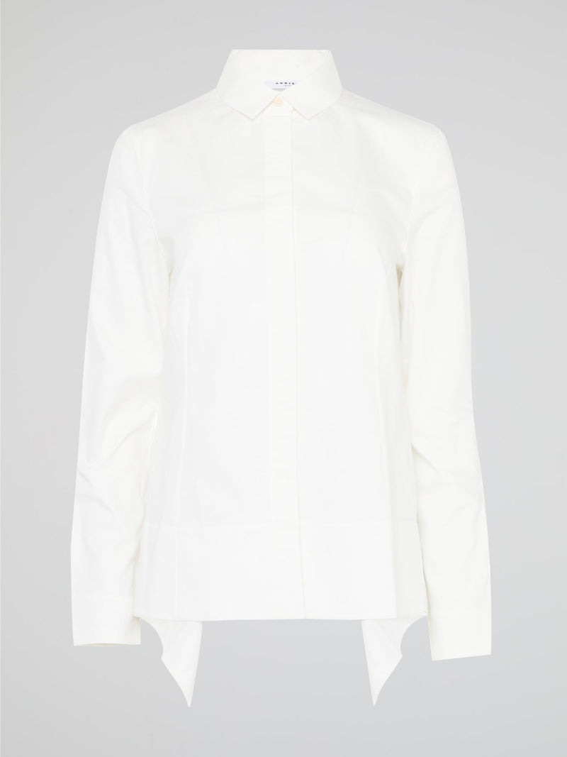 Turn heads and make a statement with the White High-Low Shirt from Akris Punto. Crafted with impeccable attention to detail, this modern twist on a classic silhouette is designed to elevate your style game. With its dynamic high-low hemline and luxurious fabric, this shirt is the epitome of effortless sophistication, perfect for any occasion.