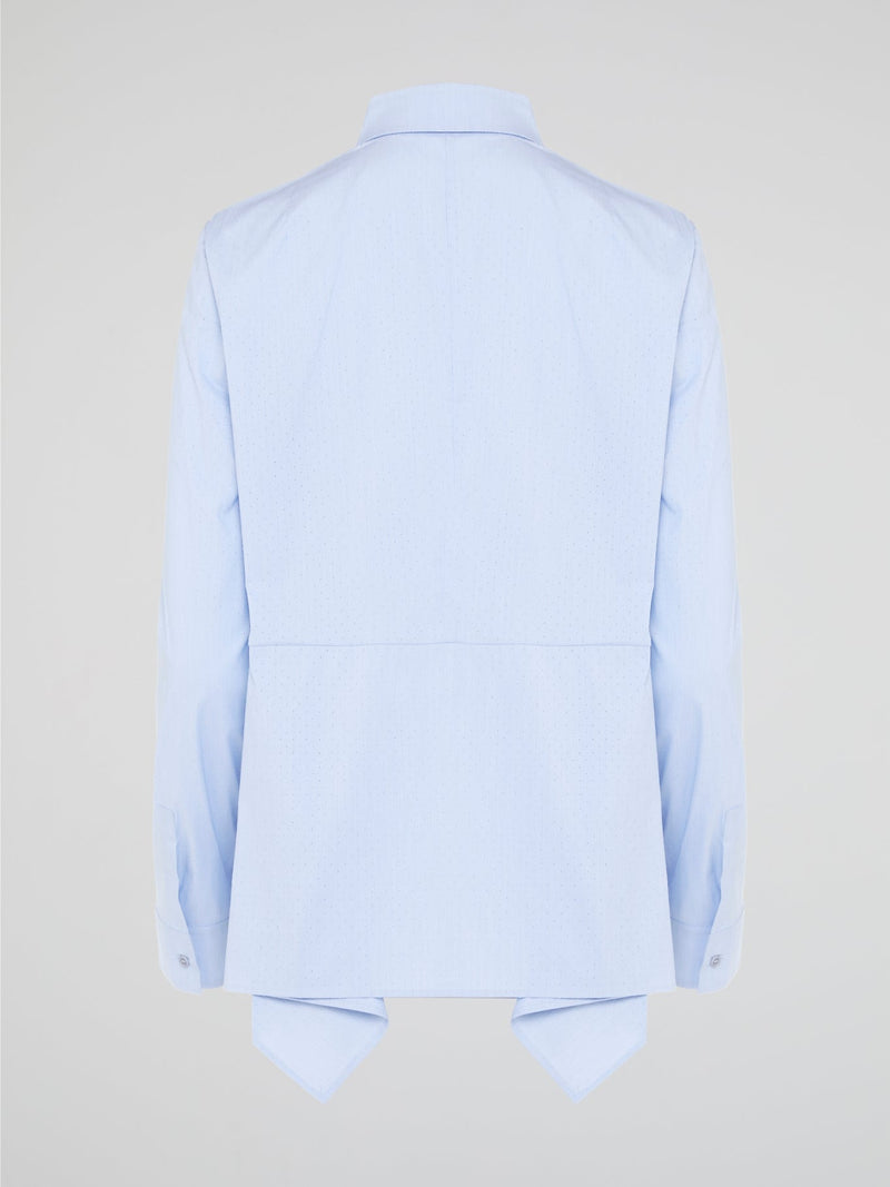 Introducing the Powder Blue High-Low Shirt by Akris Punto, where elegance meets contemporary style. Delicate powder blue hue cascades down the front, enveloping you in a calming wave of tranquility. With its unique high-low hemline and luxurious fabric, this shirt effortlessly elevates any outfit, making it a must-have piece for the fashion-forward trendsetters.