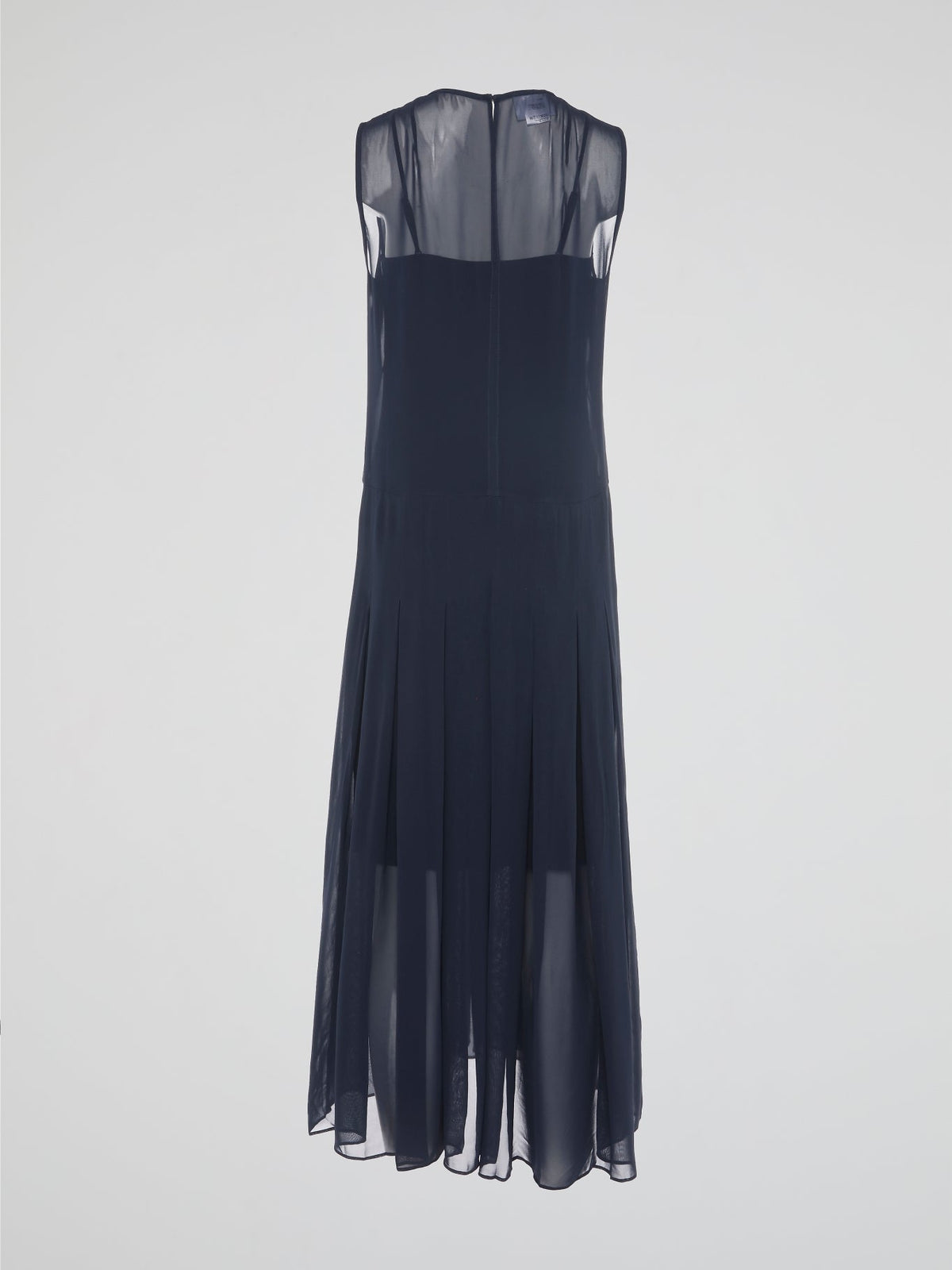 Step into elegance and grace with our Navy Pleated Maxi Dress from Akris Punto. Crafted with meticulous attention to detail, this dress showcases a flattering pleated design that beautifully flows with every step. Perfect for both formal occasions and casual outings, it's time to make a statement and be the epitome of sophistication.