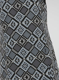 Step into a realm of elegance with our Grey Checkered Mini Dress by Akris Punto, where traditional patterns meet contemporary style. Crafted with precision and attention to detail, this dress showcases a flattering silhouette that effortlessly accentuates your curves. As you glide through any occasion, the sophisticated checkered design exudes confidence and leaves a lasting impression.