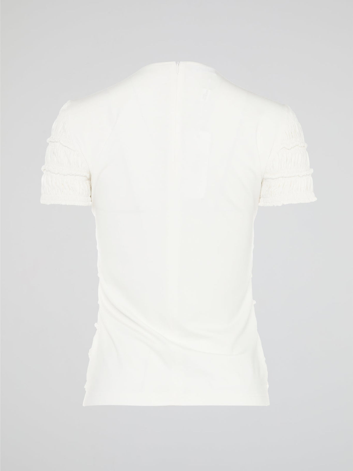 The White Tiered Top from Akris Punto is a captivating blend of sophistication and whimsy. With its unique tiered design, this versatile top adds a playful twist to any outfit. Made from premium materials, it effortlessly drapes to flatter your figure and is perfect for both casual and formal occasions.