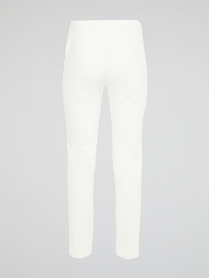 Get ready to turn heads with these stunning White Skinny Fit Trousers by Akris Punto! Designed to flatter every curve, these trousers hug your body in all the right places, giving you a sleek and elegant silhouette. Perfect for both casual and formal occasions, these versatile pants are a must-have addition to your wardrobe!