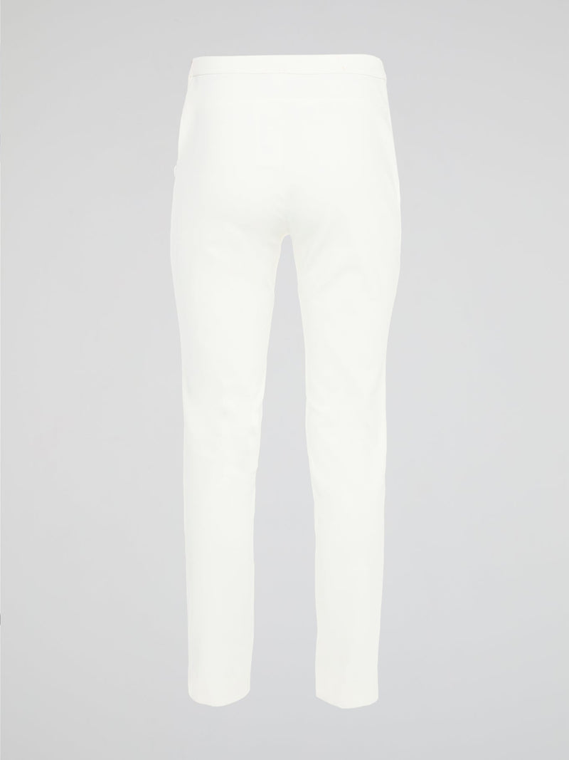 Get ready to turn heads with these stunning White Skinny Fit Trousers by Akris Punto! Designed to flatter every curve, these trousers hug your body in all the right places, giving you a sleek and elegant silhouette. Perfect for both casual and formal occasions, these versatile pants are a must-have addition to your wardrobe!