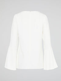 Elevate your everyday look with the White Flared Sleeve Top by Akris Punto. This contemporary and chic piece features unique flared sleeves that add a playful twist to your outfit. Made with high-quality materials, this top guarantees comfort and style, making it a must-have addition to your wardrobe.