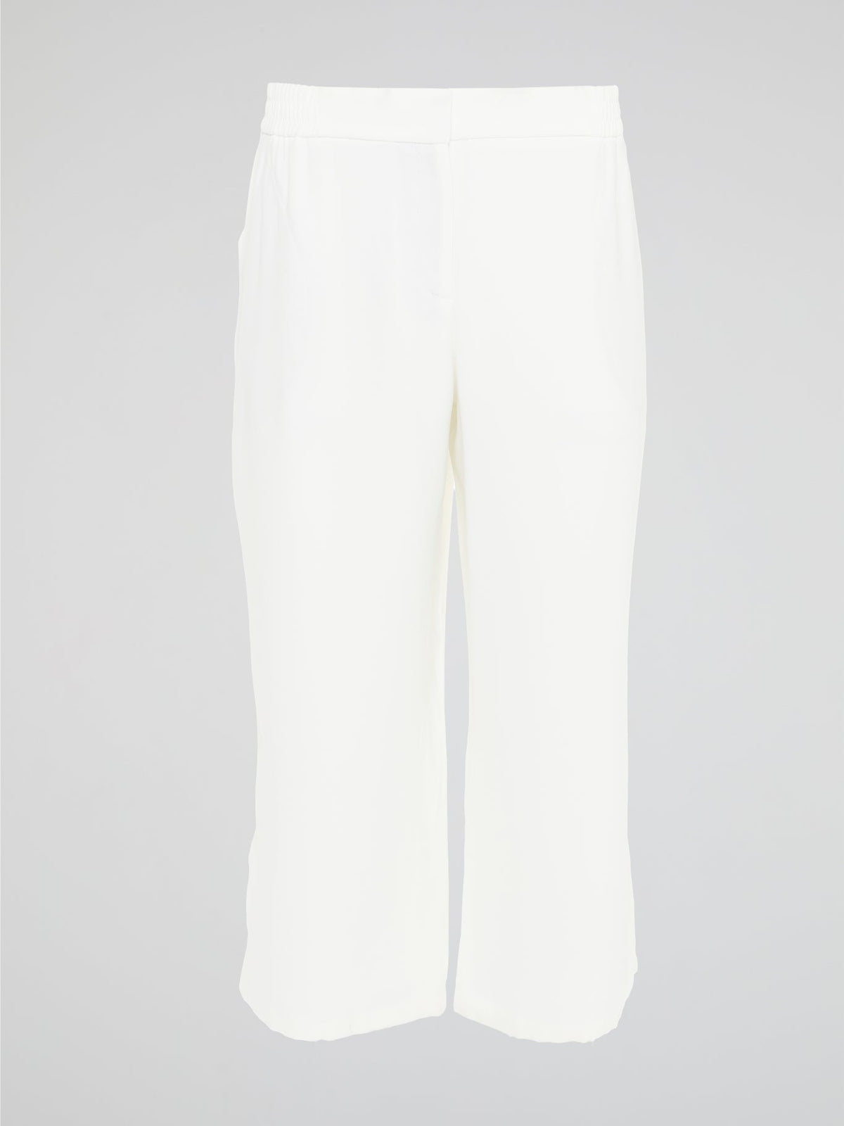 Introducing the ultimate embodiment of chic and comfort - the White Wide Leg Cropped Pants by Akris Punto. Crafted with meticulous attention to detail, these pants effortlessly blend sophistication and versatility, making them the perfect addition to any fashionista's wardrobe. Whether you're strolling on sandy beaches or attending a high-profile event, these pants will elevate your style game with their impeccable tailoring and striking silhouette.