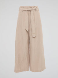 Elevate your style game with these Beige Belted Palazzo Pants from Akris Punto. Crafted with meticulous attention to detail, these pants feature a high-waisted, wide-leg silhouette that flatters every body type. The chic belted waist adds a touch of sophistication, making these pants the perfect choice for a day at the office or a stylish evening event.