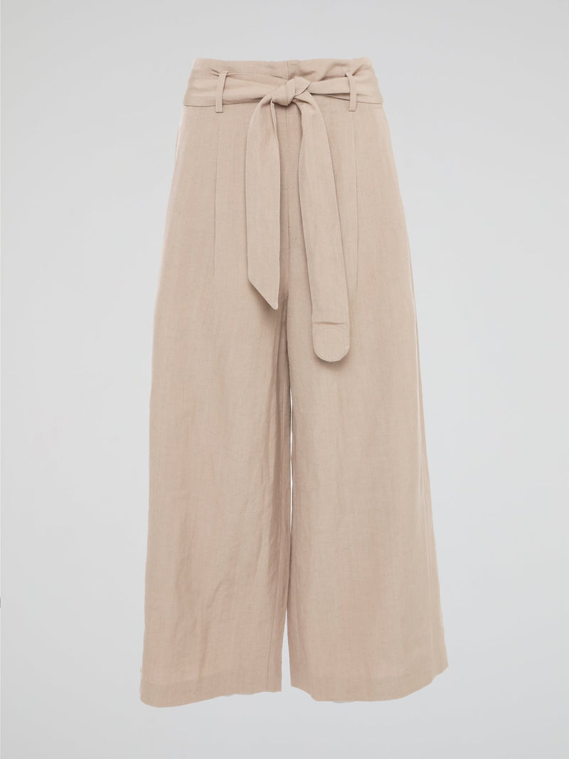 Elevate your style game with these Beige Belted Palazzo Pants from Akris Punto. Crafted with meticulous attention to detail, these pants feature a high-waisted, wide-leg silhouette that flatters every body type. The chic belted waist adds a touch of sophistication, making these pants the perfect choice for a day at the office or a stylish evening event.