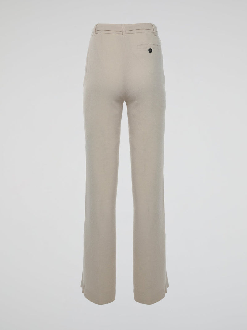 Step into the world of elegance and sophistication with Roberto Cavalli's Beige Flared Trousers. Crafted with utmost care and precision, these trousers seamlessly blend comfort and style, elevating your fashion game to new heights. Boasting a flattering flared design and a versatile beige hue, these trousers are perfect for both casual outings and formal occasions, making you the epitome of refined fashion wherever you go.