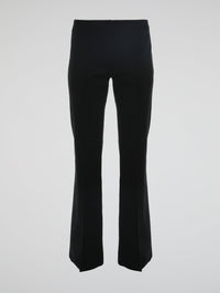 Step into the world of effortless glamour with these Black Flared Trousers by Roberto Cavalli. Crafted with meticulous precision, these trousers boast a striking silhouette that elegantly skims the figure, accentuating every curve. From the office to a night out, these trousers are a timeless wardrobe staple designed to make a bold fashion statement.