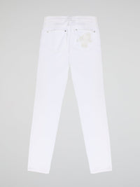 Turn heads and elevate your style with our White Straight Cut Jeans by Roberto Cavalli. Crafted with precision and attention to detail, these jeans feature a sleek and modern design that embodies sophistication and confidence. Whether you're strolling through the city or hitting the beach, these jeans are sure to make a statement and redefine your fashion game.