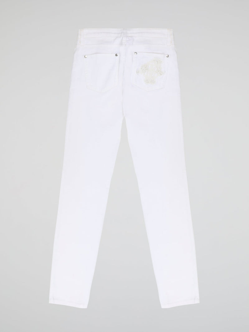 Turn heads and elevate your style with our White Straight Cut Jeans by Roberto Cavalli. Crafted with precision and attention to detail, these jeans feature a sleek and modern design that embodies sophistication and confidence. Whether you're strolling through the city or hitting the beach, these jeans are sure to make a statement and redefine your fashion game.