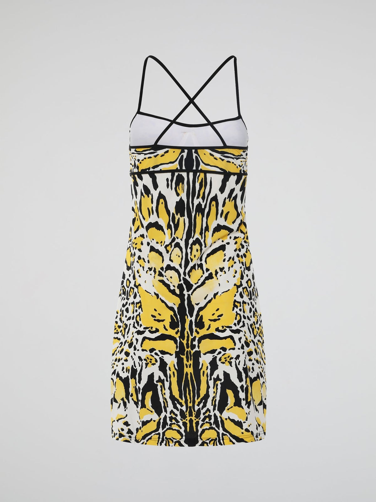 Introducing the Yellow Printed Strap Dress by Roberto Cavalli, where elegance meets vibrant playfulness. This enchanting masterpiece features a luxurious silky fabric adorned with a captivating pattern of intricate yellow hues, perfect for making a statement at any event. With its flattering silhouette and delicate straps, this dress effortlessly embodies the essence of modern glamour, promising to leave a lasting impression wherever you go.