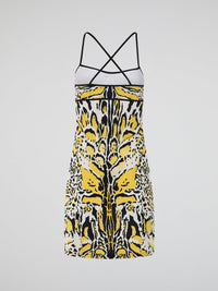 Introducing the Yellow Printed Strap Dress by Roberto Cavalli, where elegance meets vibrant playfulness. This enchanting masterpiece features a luxurious silky fabric adorned with a captivating pattern of intricate yellow hues, perfect for making a statement at any event. With its flattering silhouette and delicate straps, this dress effortlessly embodies the essence of modern glamour, promising to leave a lasting impression wherever you go.