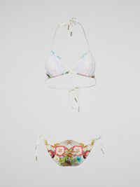 Dive into a garden of exotic elegance with Roberto Cavalli's Floral Print Swimwear. Inspired by the breathtaking beauty of blooming flowers, this collection features vibrant colors and intricate floral patterns that make a bold statement by the pool or beach. Crafted with the finest materials and impeccable attention to detail, each swimsuit radiates luxury and sophistication, allowing you to immerse yourself in a world of floral fantasy while making heads turn wherever you go.
